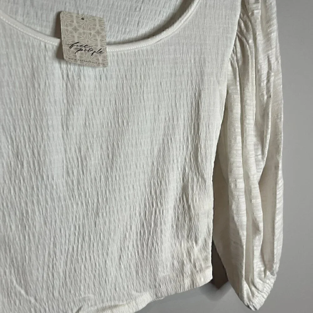 NWT Free People white smocked bishop sleeve top